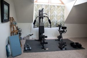 Read more about the article How to Decorate Around Home Gym Equipment