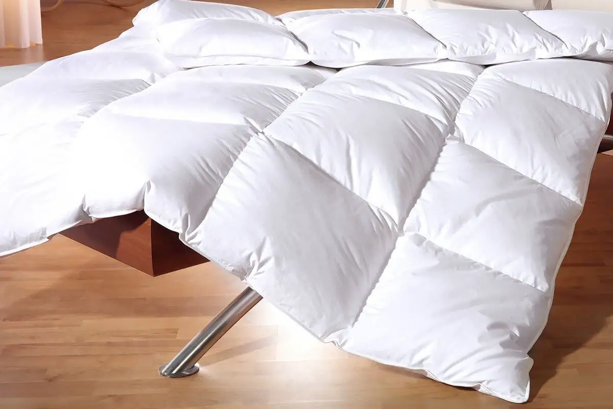 Ballet White vs. Feather Down Choosing the Perfect Bedding for a Luxurious Sleep Experience