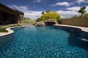 Read more about the article Quartzscapes vs. Pebble Tec: Which Pool Finish Is Right for You?