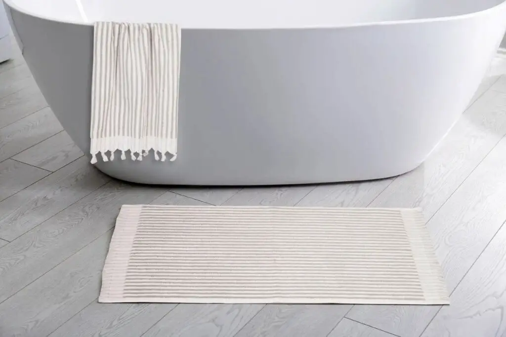 Bath Rug vs. Bath Mat Choosing the Right Bathroom Floor Covering