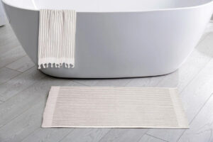 Read more about the article Bath Rug vs. Bath Mat: Choosing the Right Bathroom Floor Covering